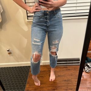 Buckle distressed denim jeans